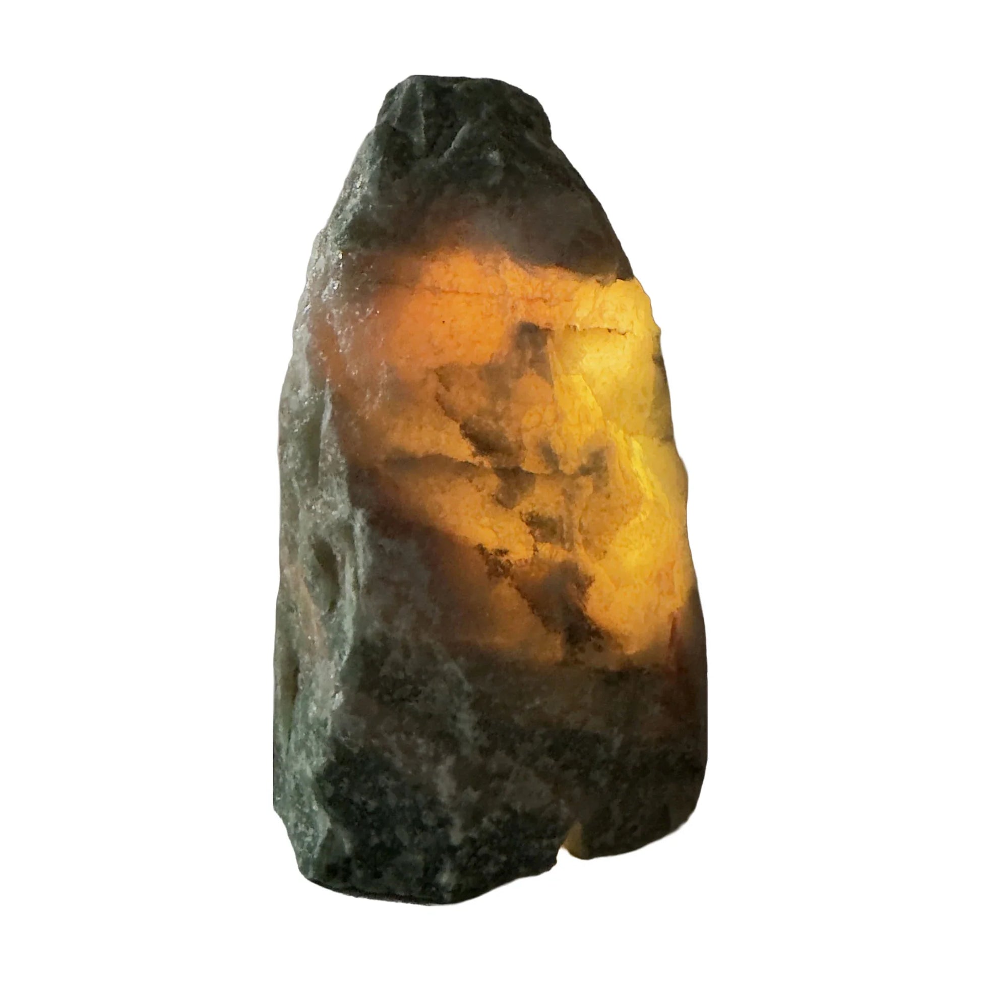 Green aventurine crystal lamp lit, warm green-gold glow through the stone