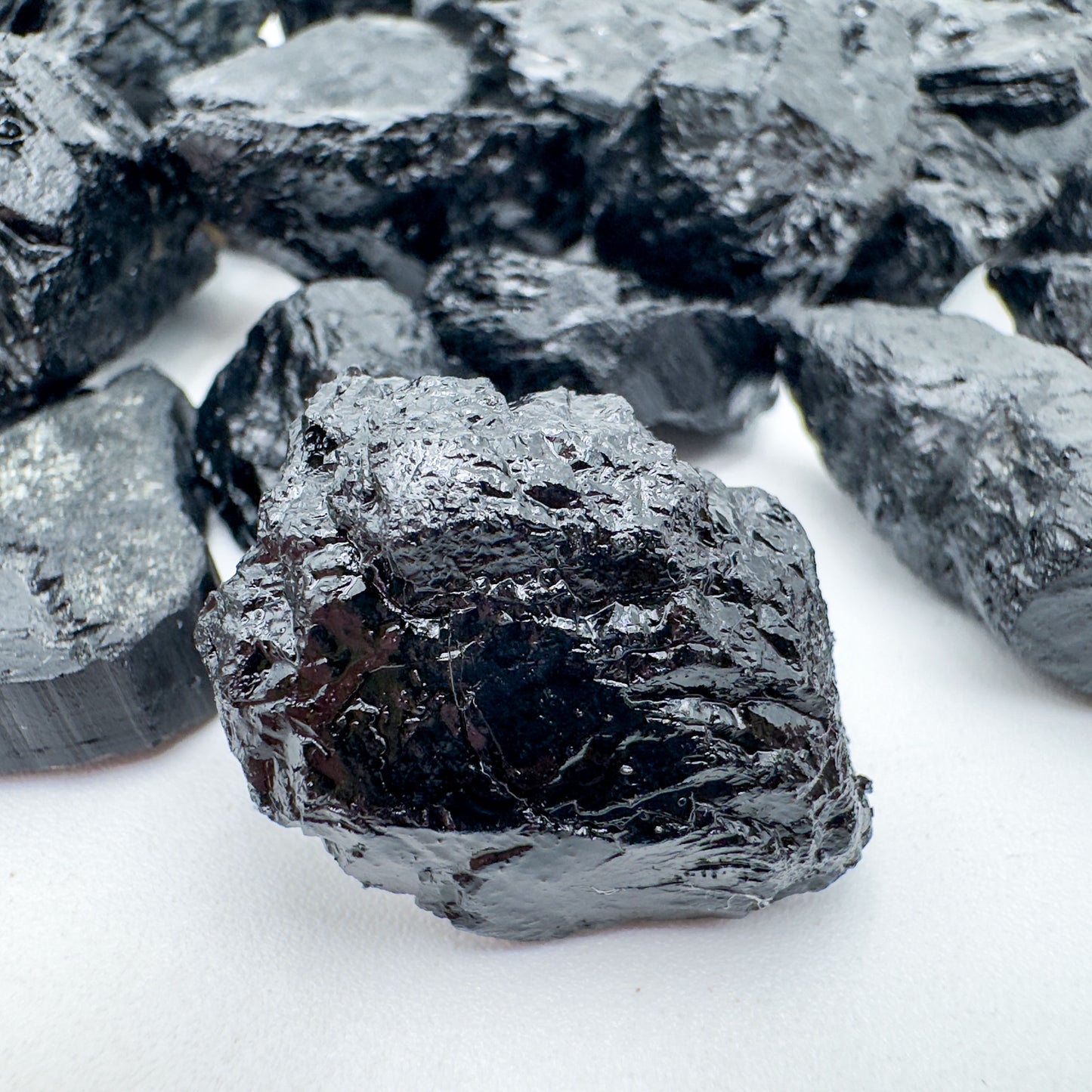 Overhead angle of Black Tourmaline raw stone, from Minas Gerais, Brazil, showing characteristic patterning.