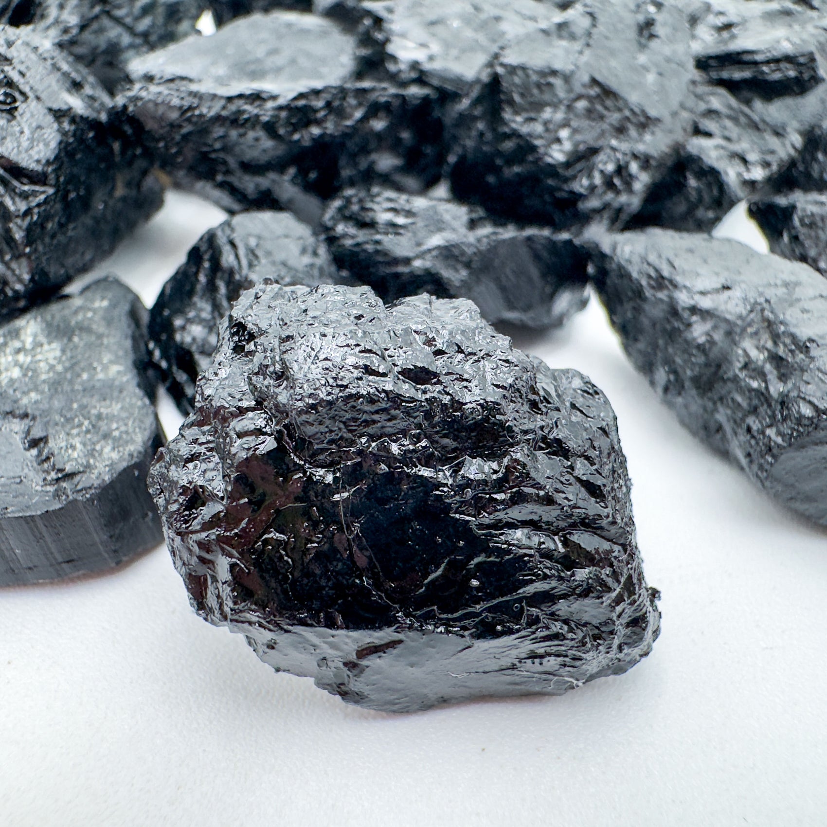 Overhead angle of Black Tourmaline raw stone, from Minas Gerais, Brazil, showing characteristic patterning.