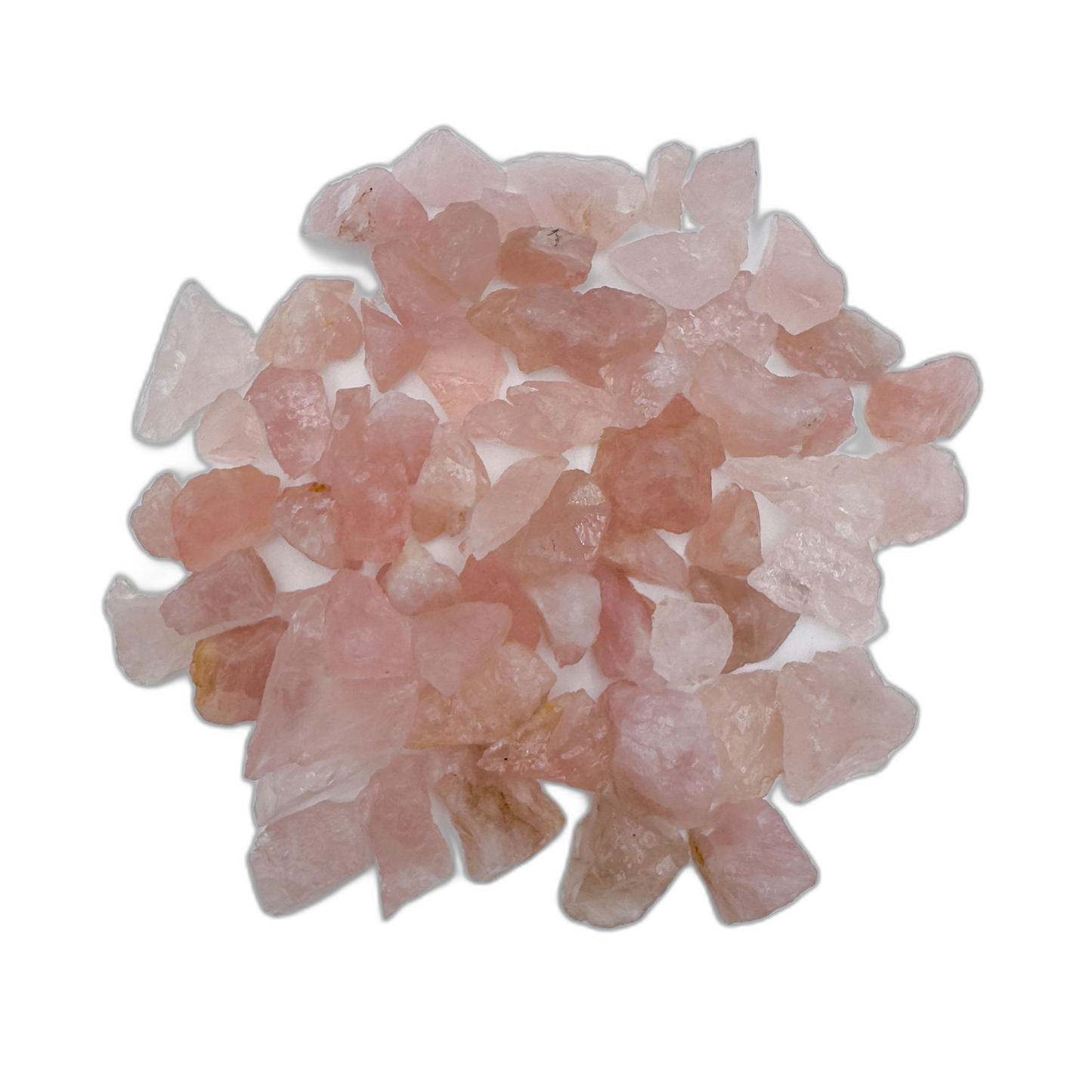 Magnified detail of Rose Quartz raw stone, hand-selected from Minas Gerais, Brazil, showing tight grain.