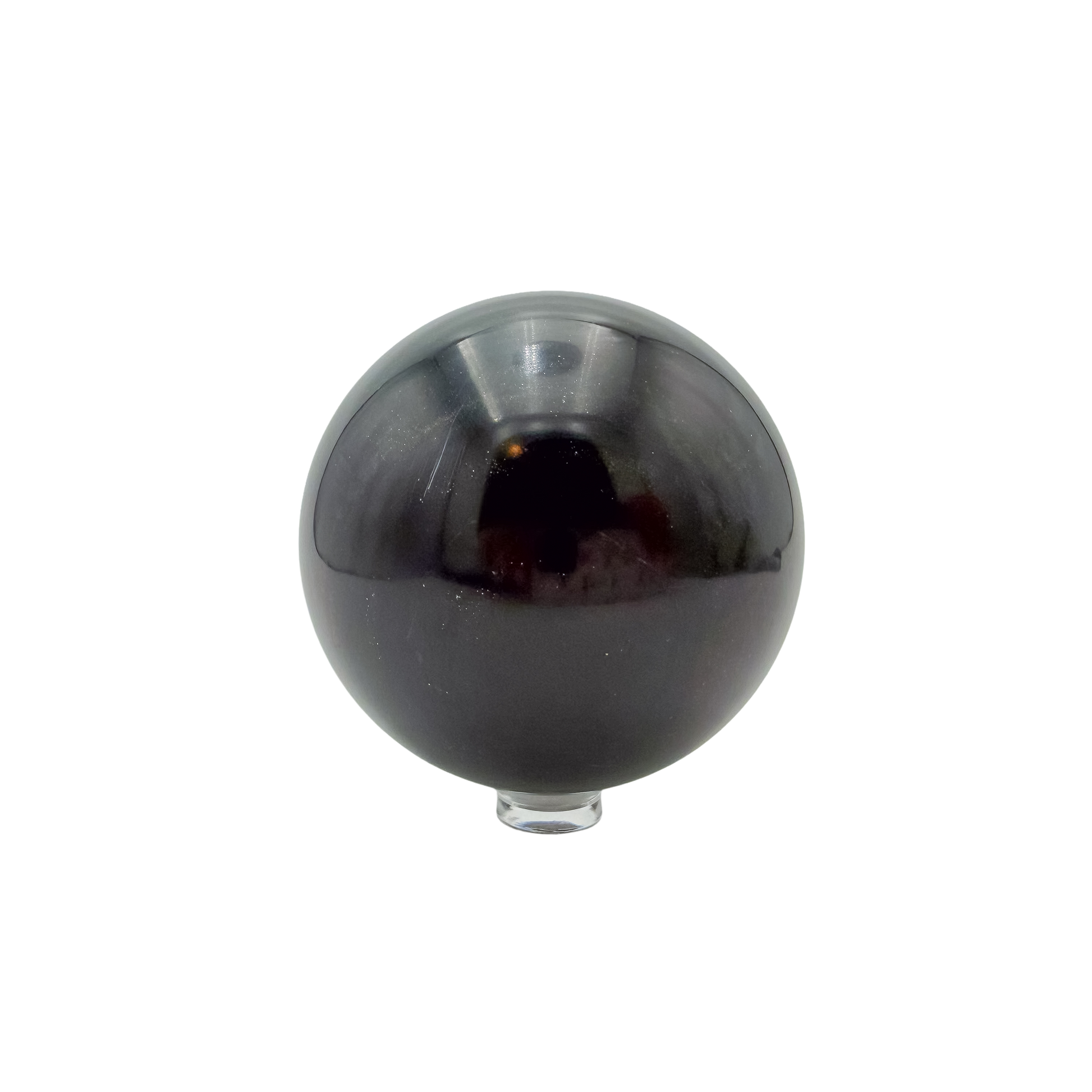 Reverse side of a hand-polished black jade sphere, 2.87 inches across, cut from Peru material.