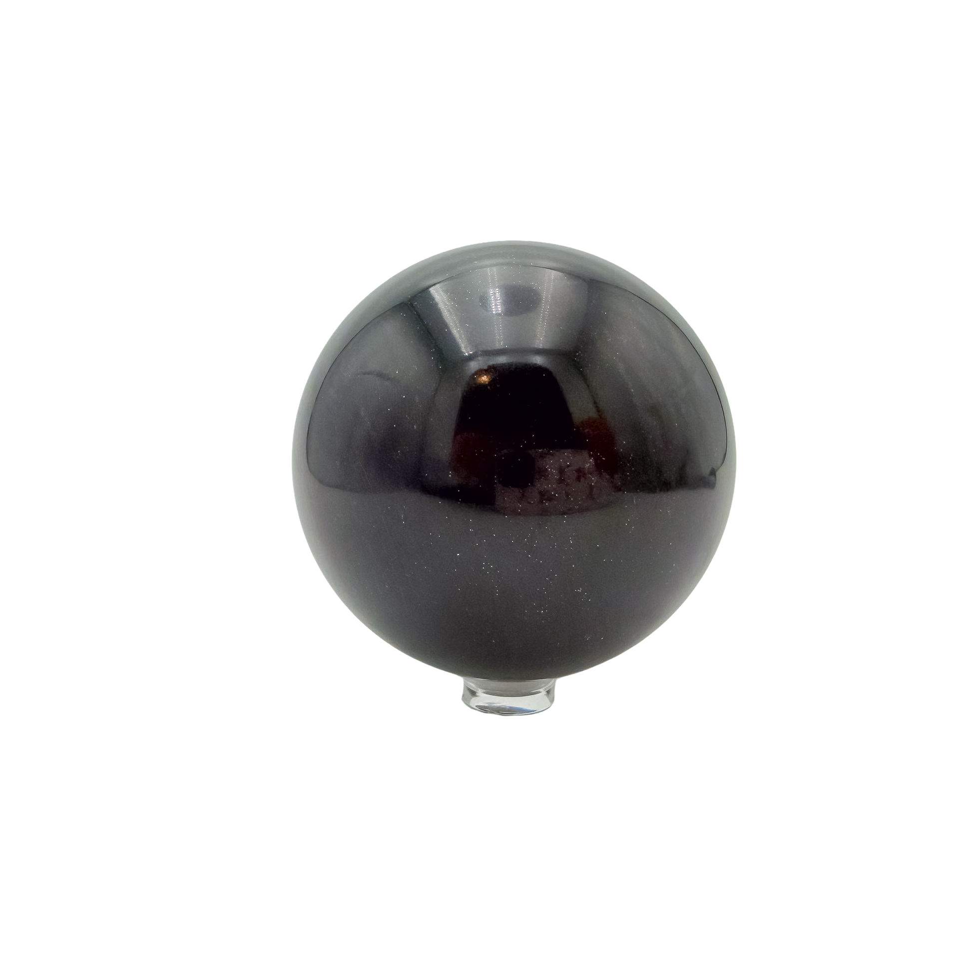 The left profile of this 554 gram black jade sphere, showing the mirror finish across 72.9 millimeters of stone.