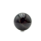 Black Jade sphere photographed from the right profile, 2.87 in diameter, natural and untreated.