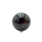 Top-down view of black jade sphere no. 1, 72.9 mm across, hand-cut in Peru.