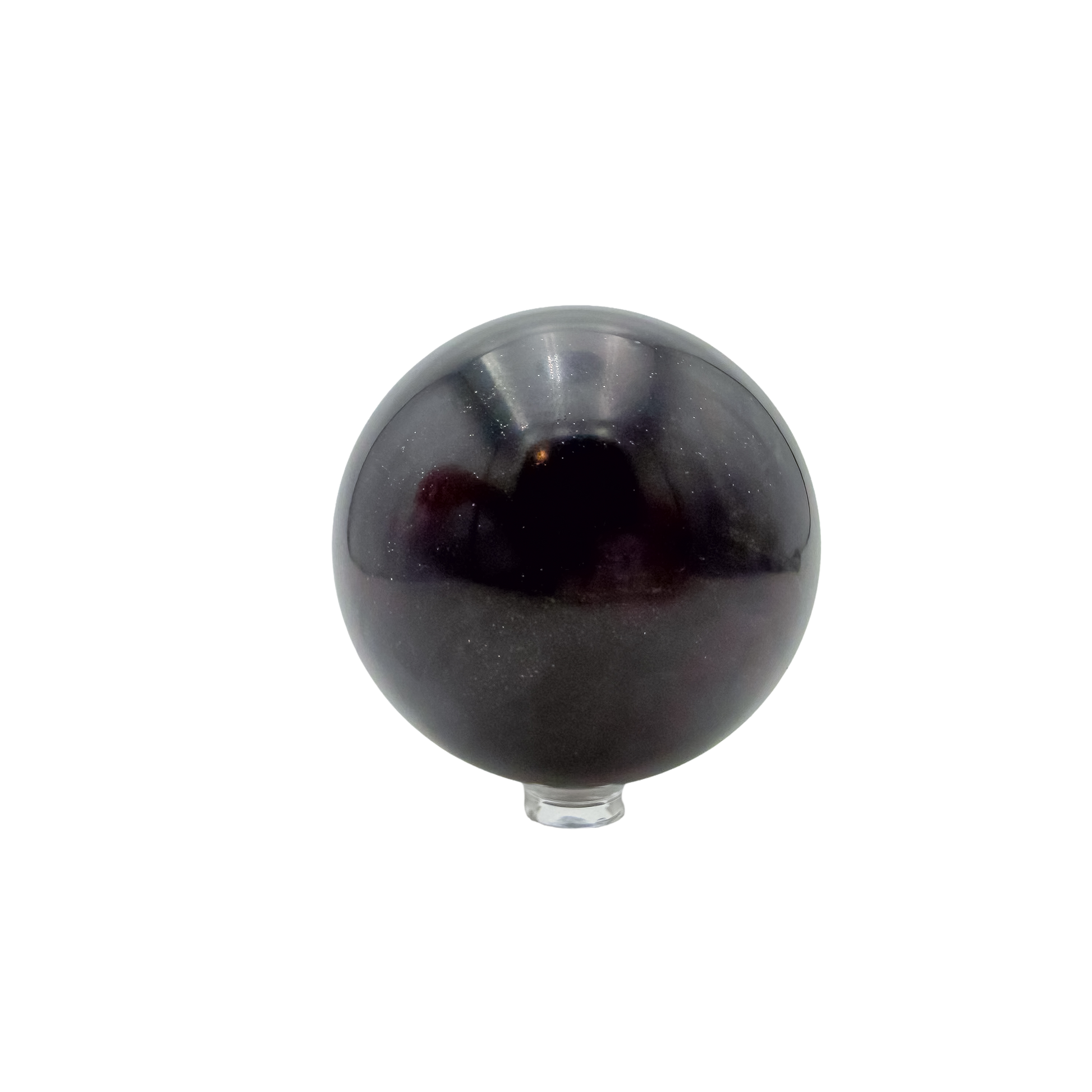 The left profile of this 530 gram black jade sphere, showing the mirror finish across 71.4 millimeters of stone.