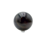Top-down view of black jade sphere no. 4, 71.4 mm across, hand-cut in Peru.