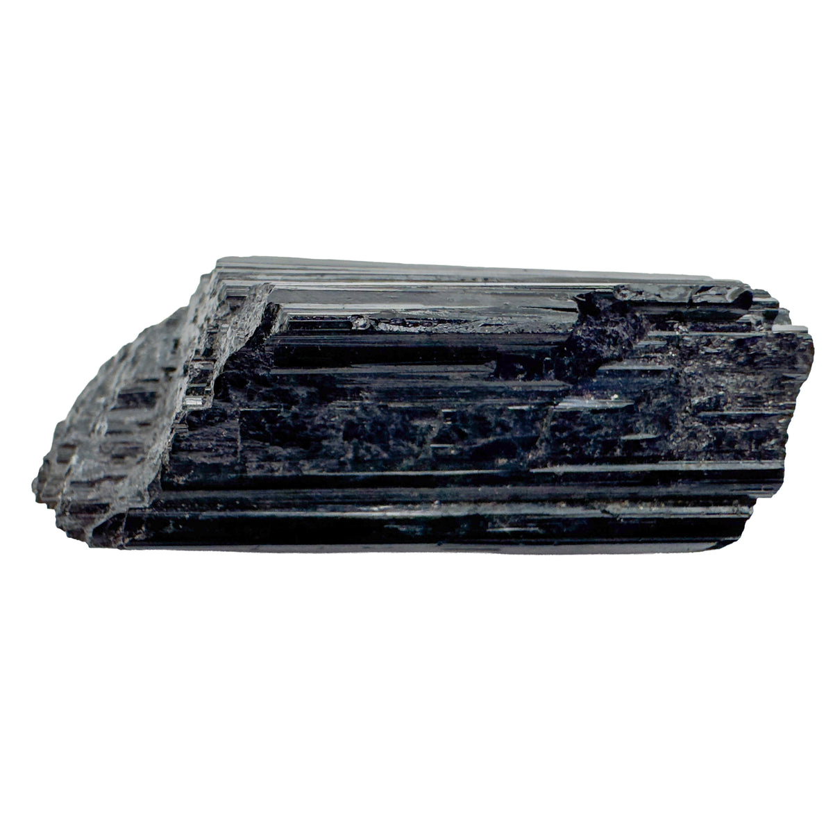 Black Tourmaline Raw Crystals, AA Grade, Brazil: one striated black crystal on a white background