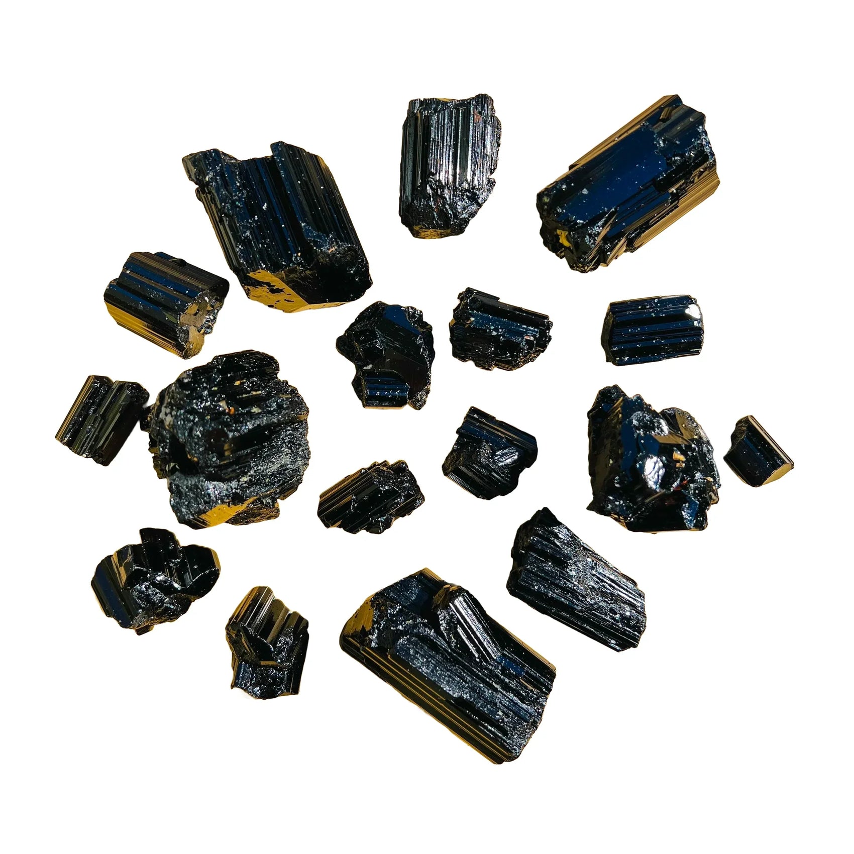 Up-close view of Black Tourmaline raw stone, sourced from Vakinankaratra, Madagascar, showing tight grain.
