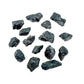 Close detail of Black Tourmaline raw stone, associated with Protection and Grounding.