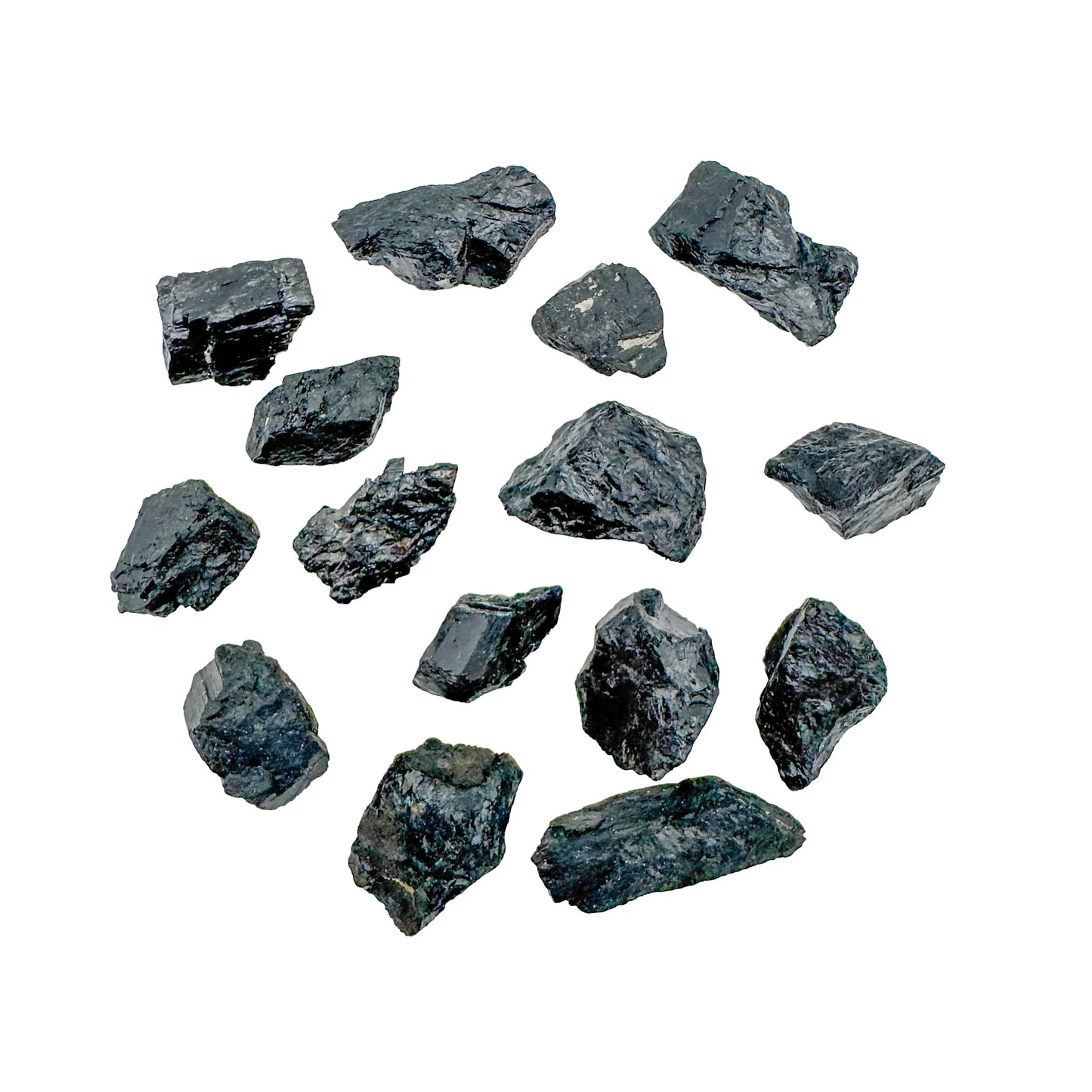 Close detail of Black Tourmaline raw stone, associated with Protection and Grounding.