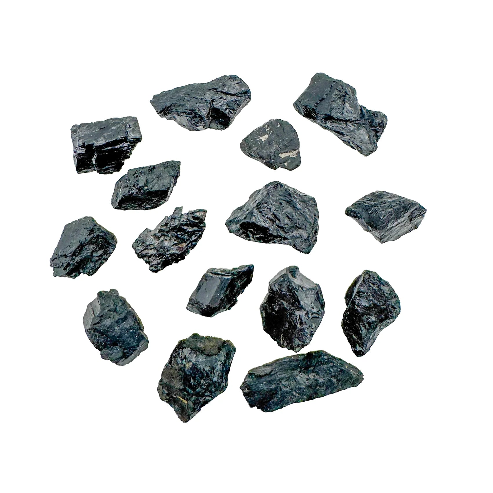 Close detail of Black Tourmaline raw stone, associated with Protection and Grounding.