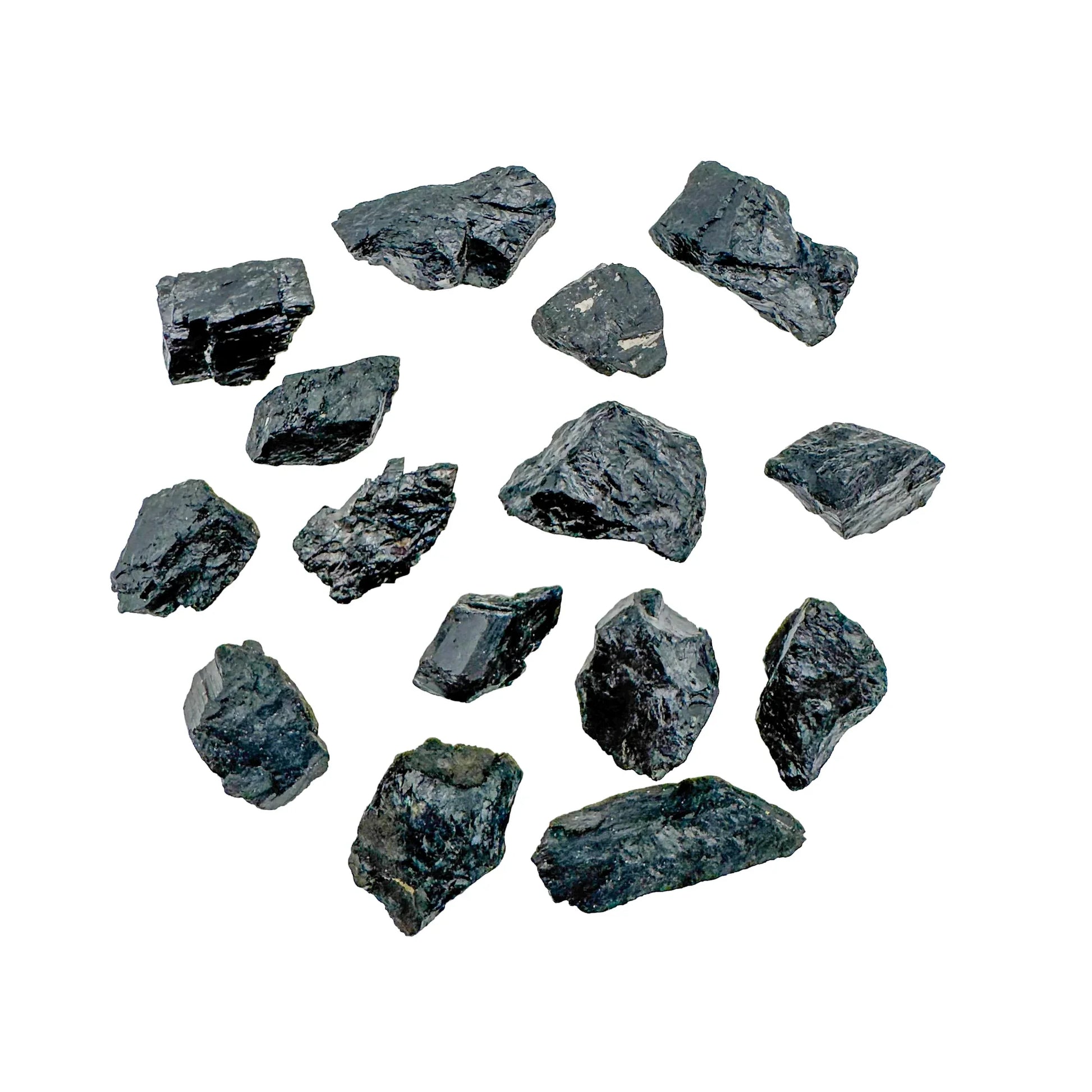 Close detail of Black Tourmaline raw stone, associated with Protection and Grounding.