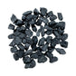 Texture-level view of Black Tourmaline raw stone, hand-selected from Minas Gerais, Brazil.