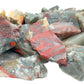 Pile of raw Bloodstone stones, green heliotrope with red flecks, Eswatini