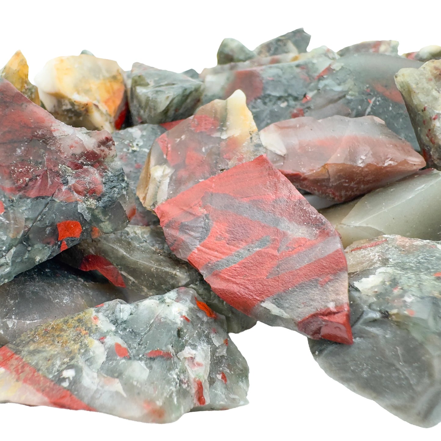 Pile of raw Bloodstone stones, green heliotrope with red flecks, Eswatini