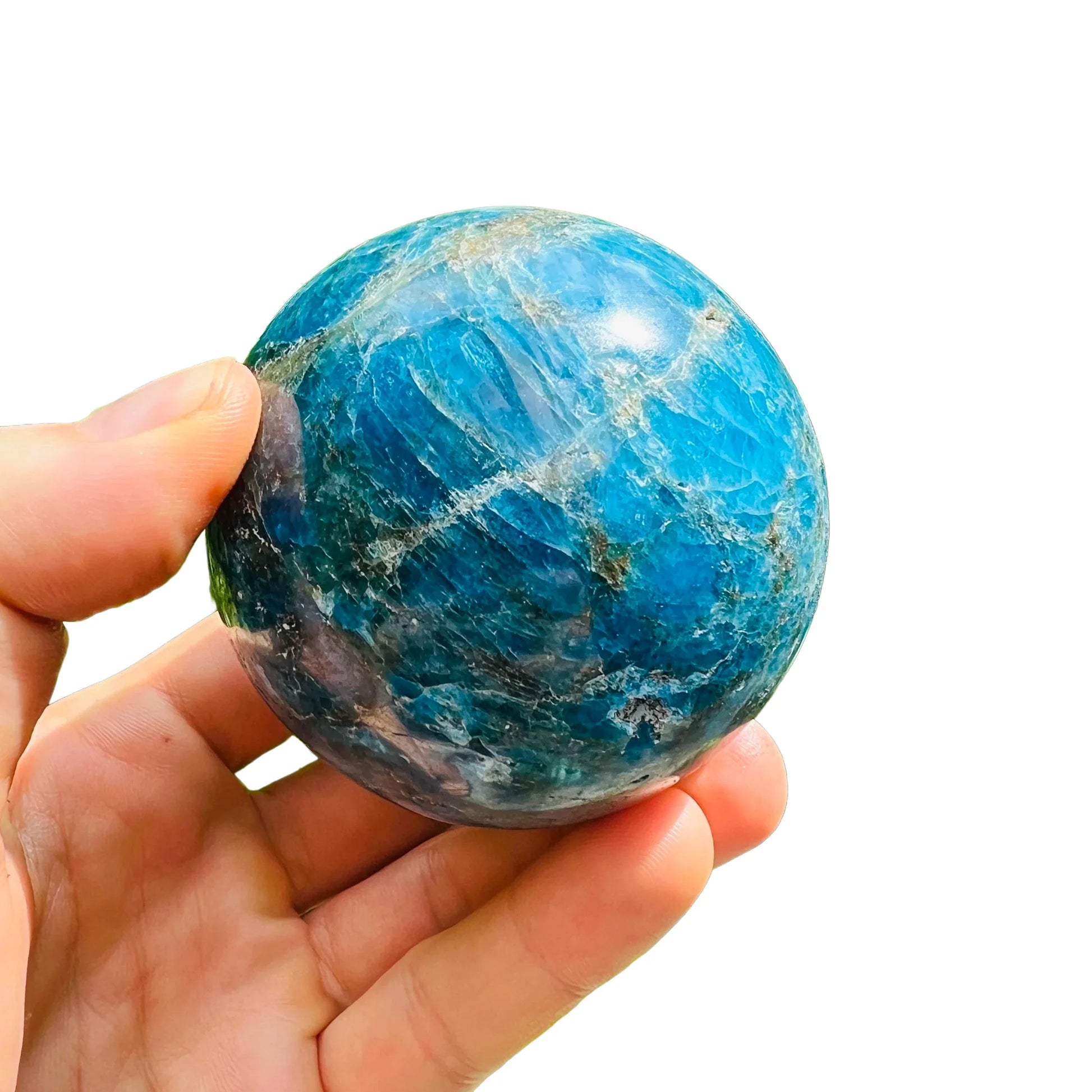 Looking down on Apatite polished sphere, from Madagascar, traditionally used for Focus.