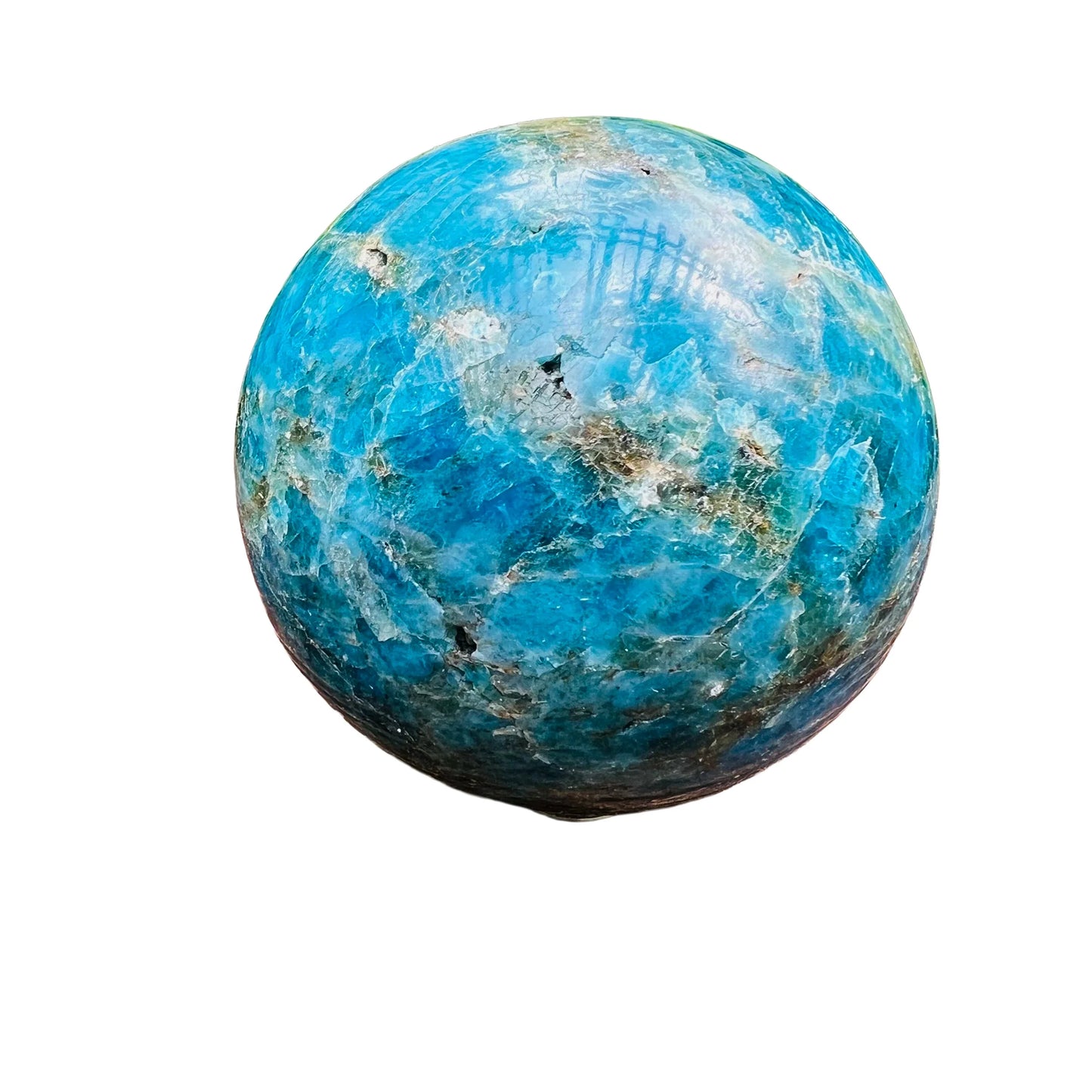 Held in hand, a Apatite polished sphere often paired with practices around Focus, Madagascar-sourced.