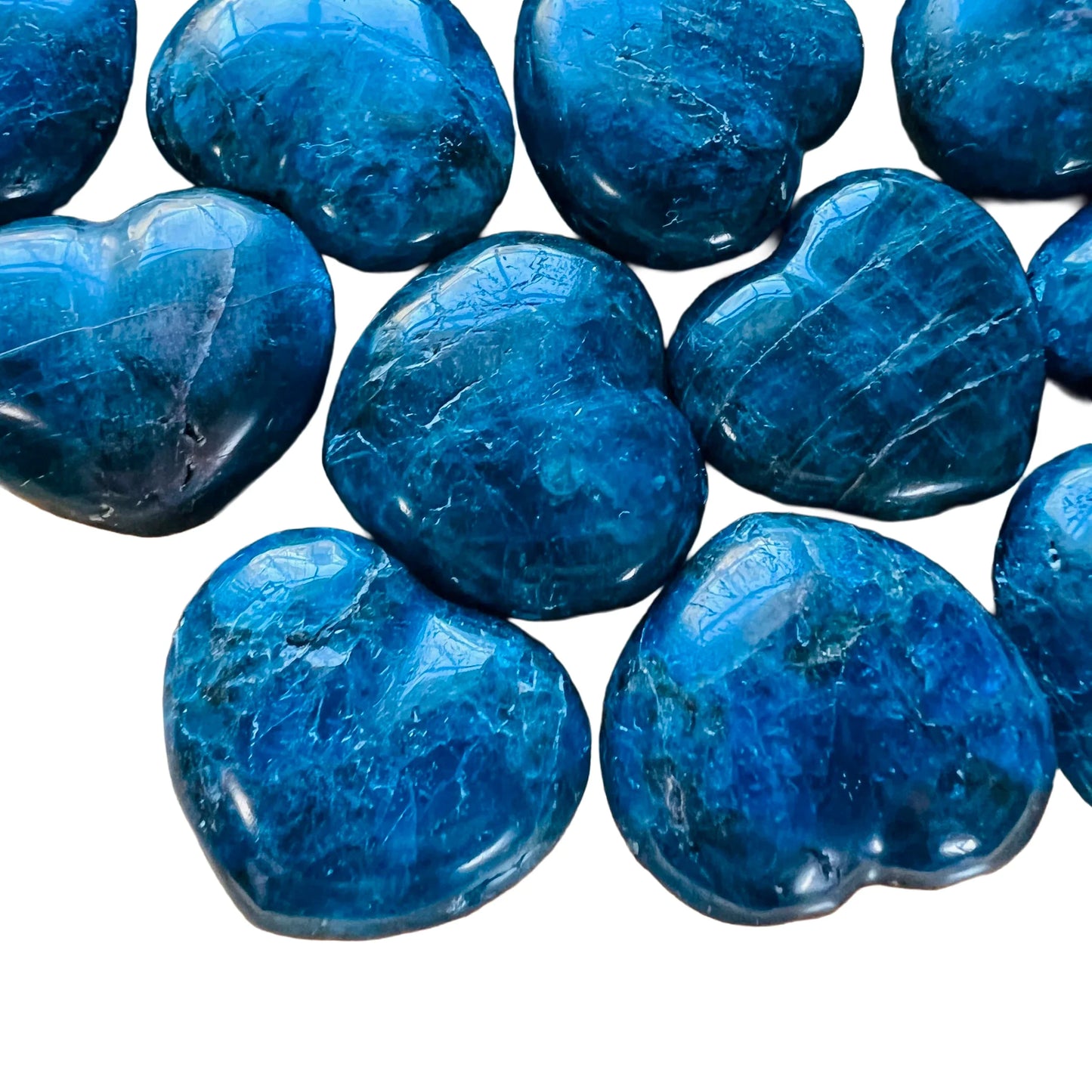 Close-up of Apatite polished heart, showing earthy tone, from Madagascar.