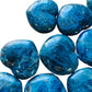 Sideways view of Apatite polished heart, Madagascar-sourced, associated with Focus.
