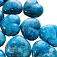 Back view of Apatite polished heart, hand-selected from Anosy, Madagascar, traditionally used for Focus.