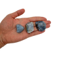Three A Grade Blue Calcite raw stones held in hand for scale, from Madagascar