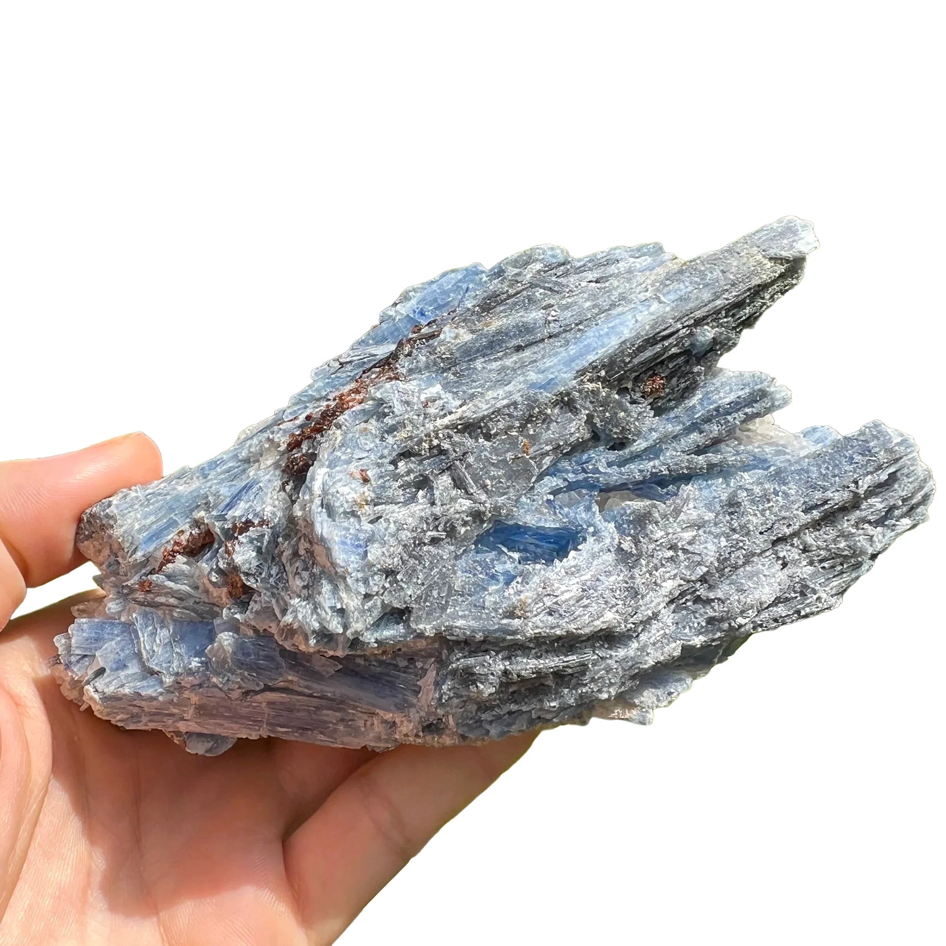 In-hand view of a Blue Kyanite specimen, from Brazil.