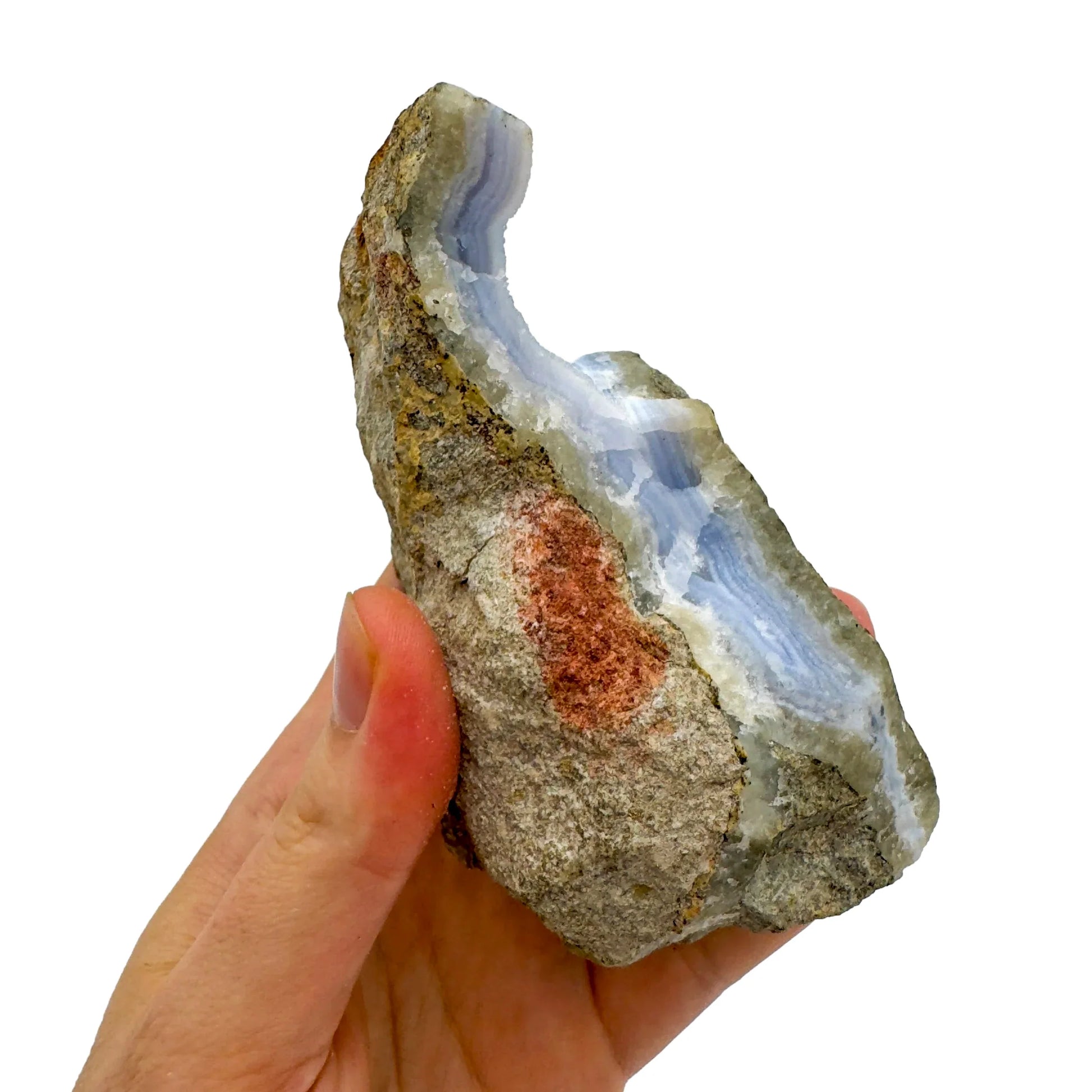Detail shot of Grade AA Blue Lace Agate geode under natural light