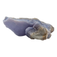 Blue lace agate raw geode, wide banded face angled into the light