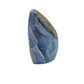 Edge view of Blue Lace Agate raw geode, drawn on for Stress Relief, showing natural banding.