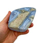 Detail shot of Grade AA Blue Lace Agate geode under natural light