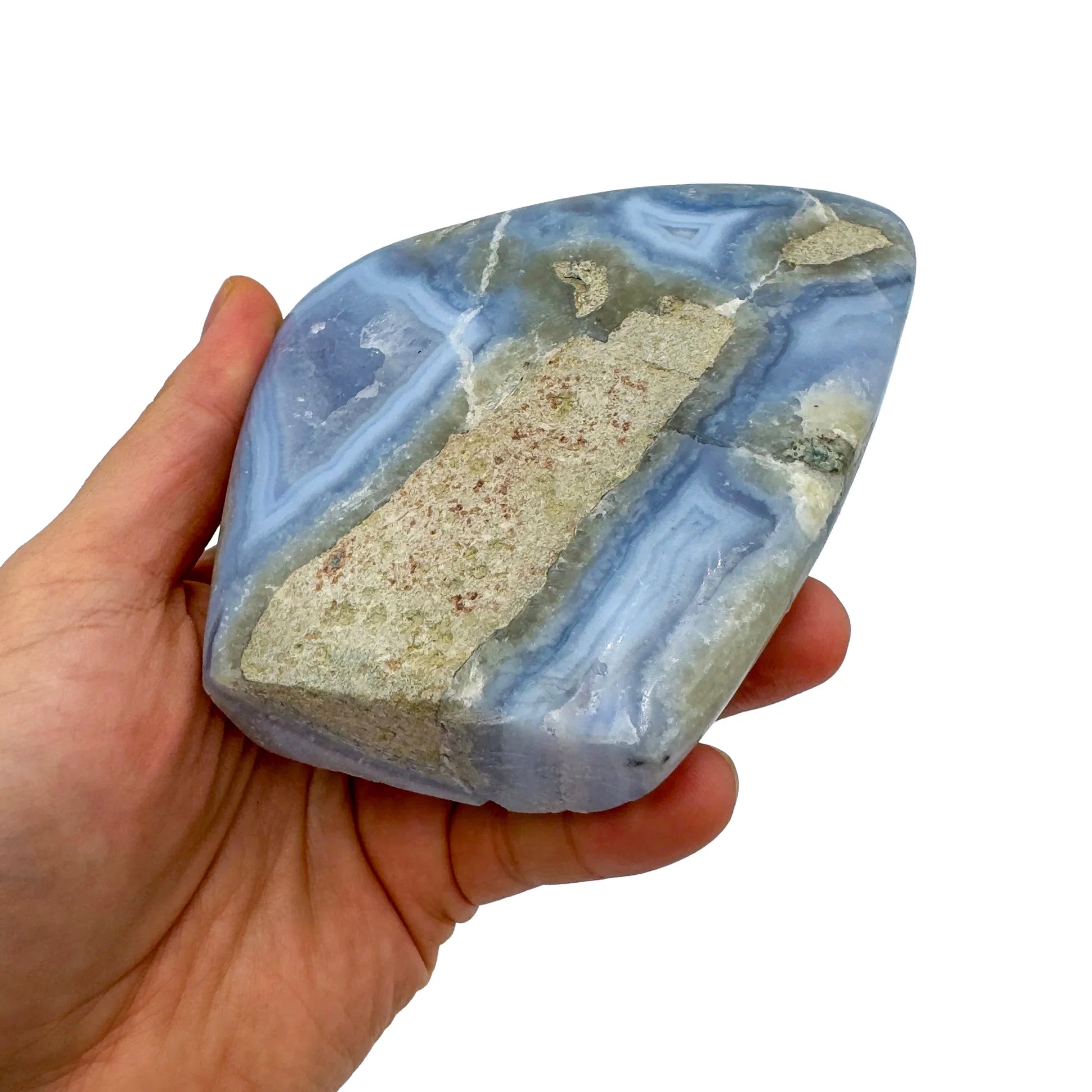 Detail shot of Grade AA Blue Lace Agate geode under natural light