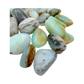 Side angle of Blue Opal tumbled stone from Acari, Peru