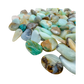 Side angle of small Blue Opal tumbled stones from Acari, Peru