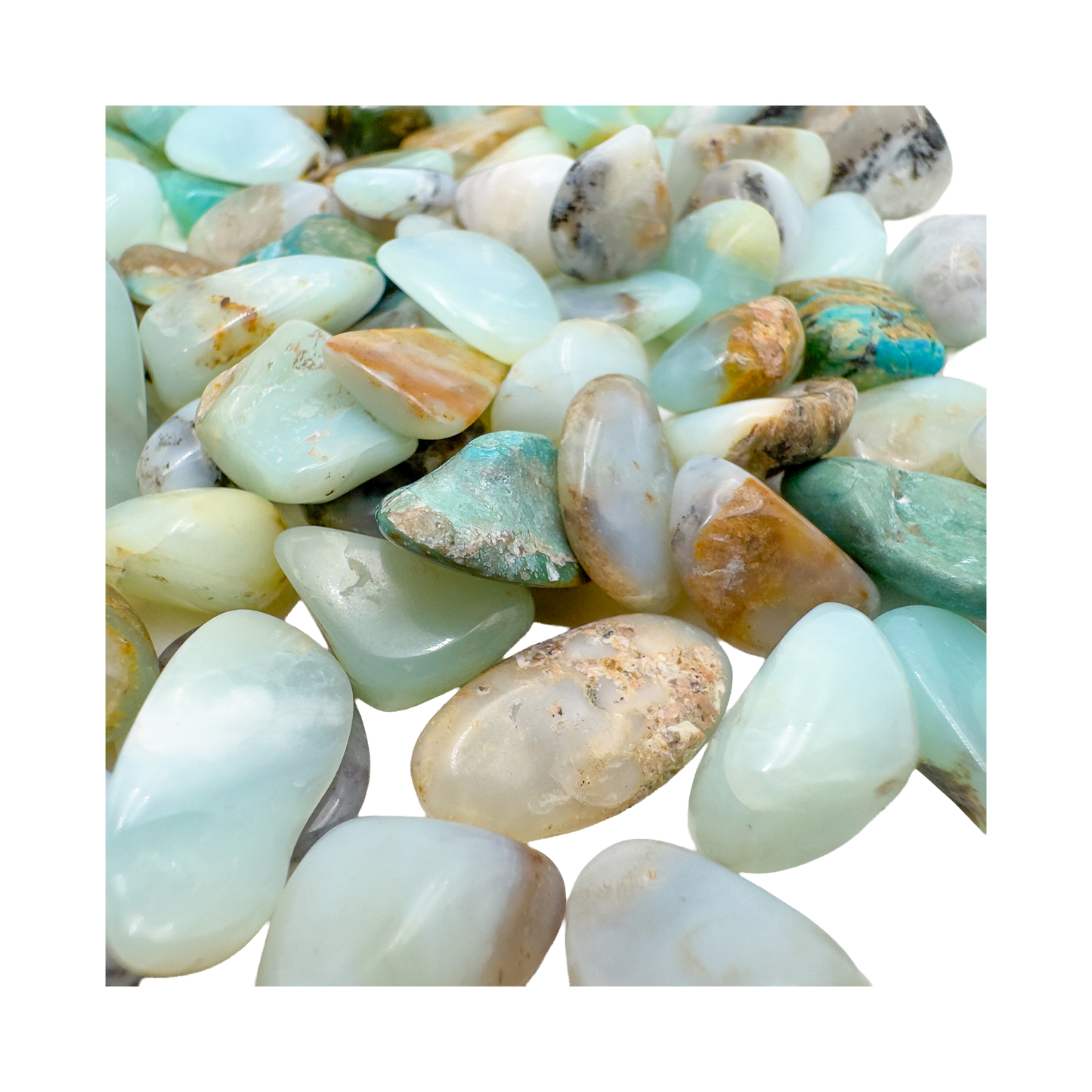 Top view of small Andean Blue Opal tumbled stones, AA grade Peru