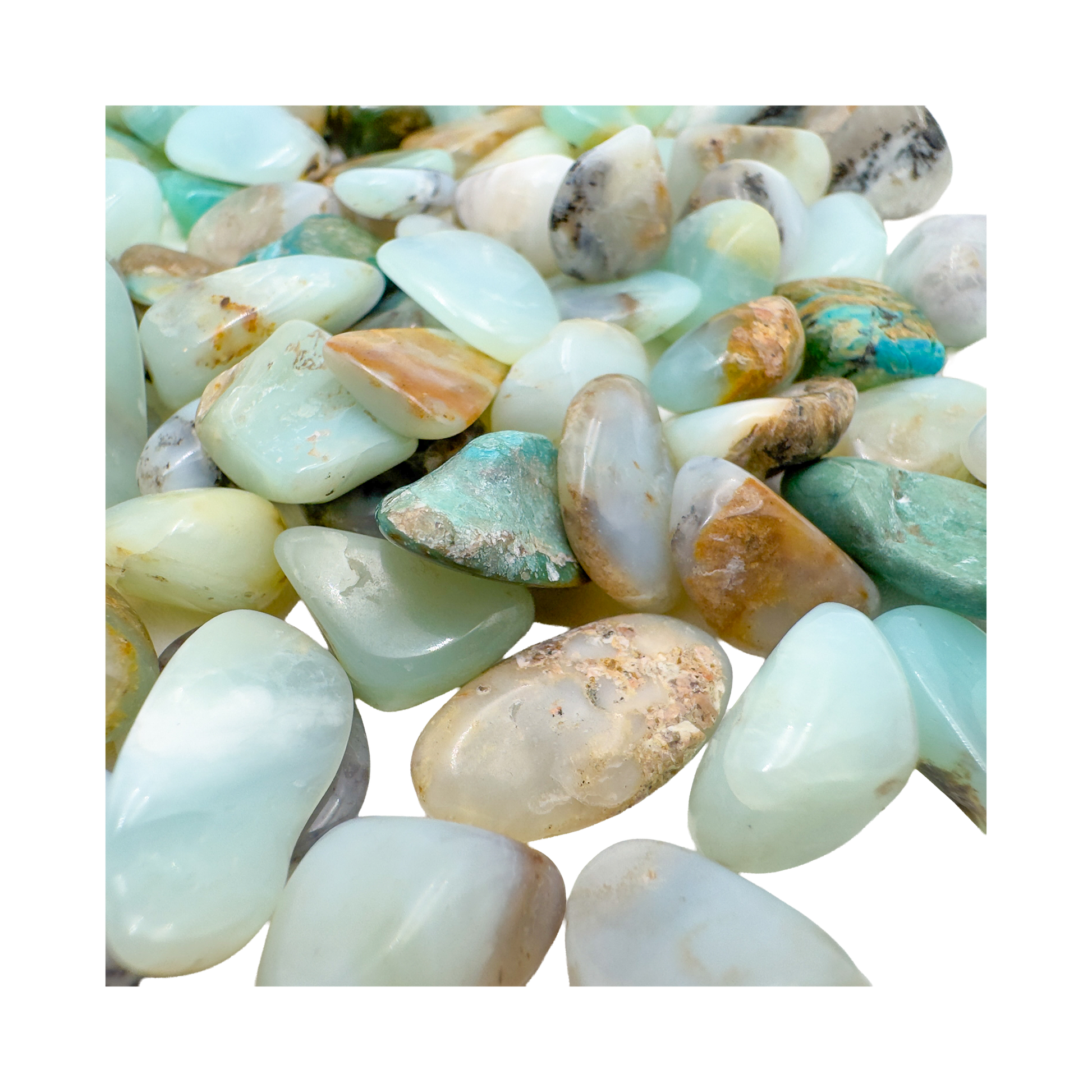 Top view of small Andean Blue Opal tumbled stones, AA grade Peru