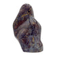Open-palm view of Blue Rose Quartz stone, traditionally used for Confidence, shown at hand scale.