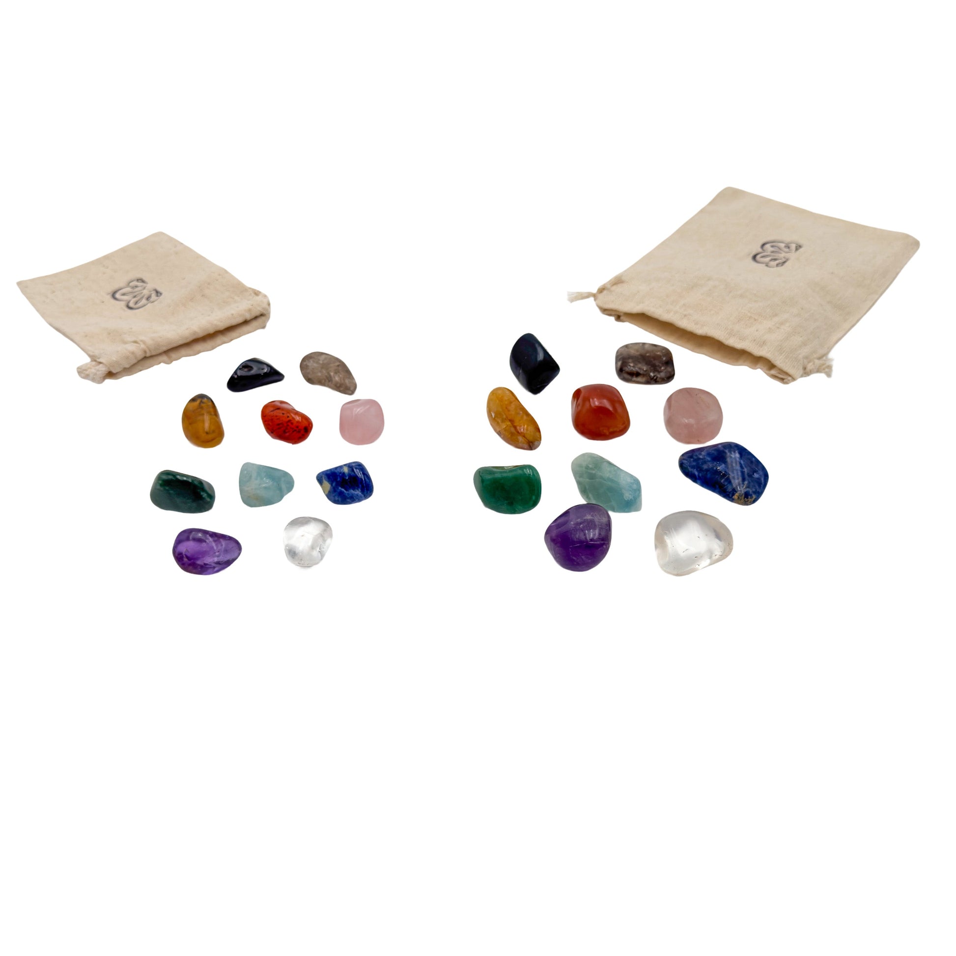 Small and large Brazilian tumbled stone sets with their cotton bags, second arrangement