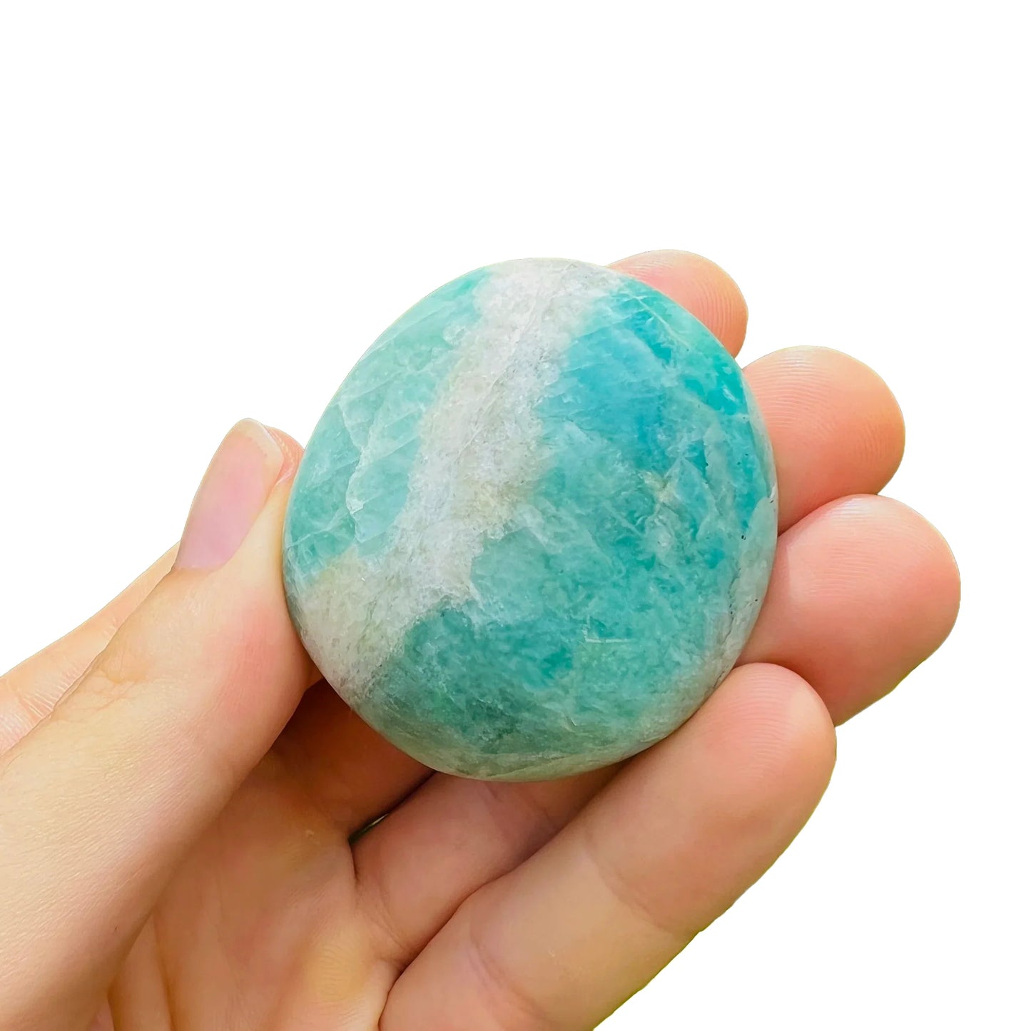 Lifestyle still of Amazonite palm stone, from Amboasitra, Madagascar, captured in soft, even lighting.