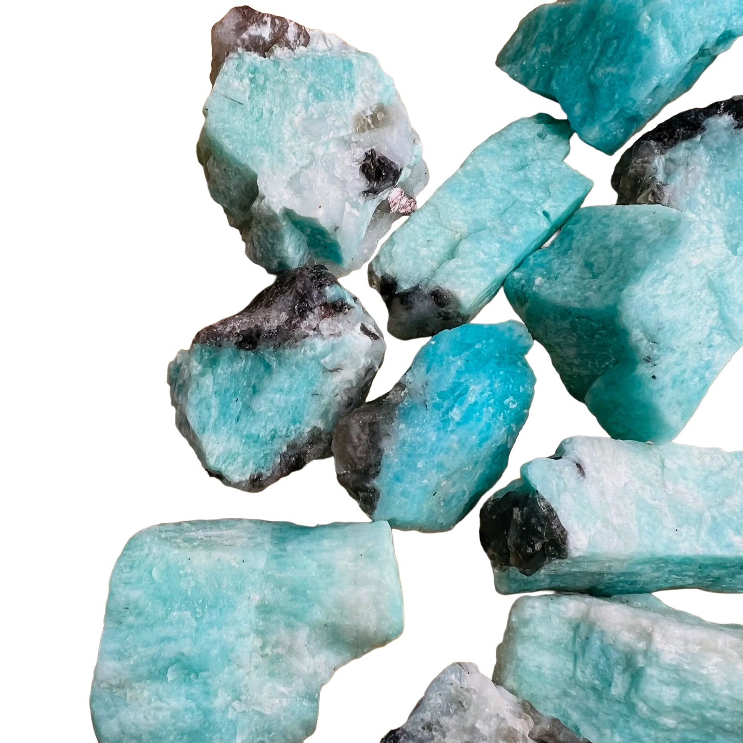 Overhead view of Grade AA Amazonite raw stone, hand-selected from Amboasitra, Madagascar, worked with for Stress Relief.