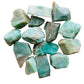 Close-up of Grade A blue Amazonite raw stone, often paired with practices around Stress Relief, showing characteristic finish.