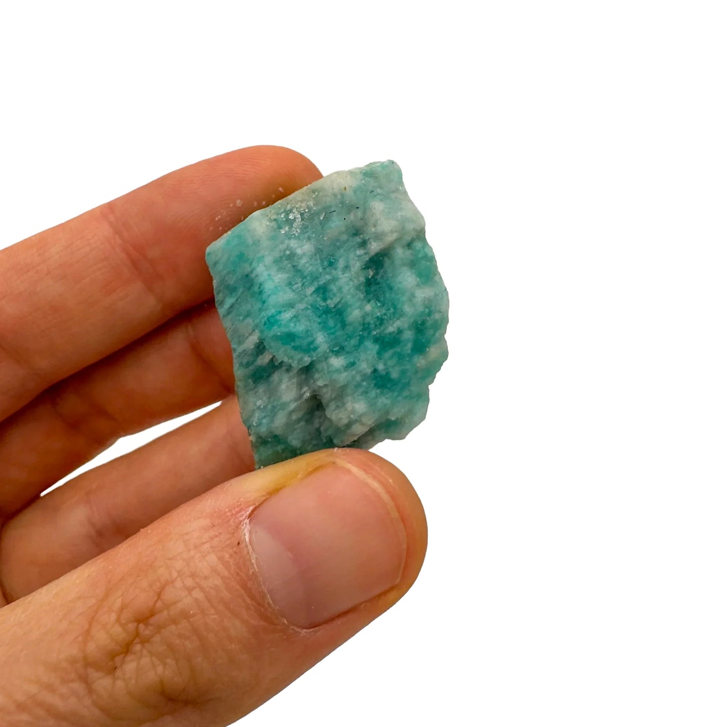 Grade a amazonite raw held in hand for size reference