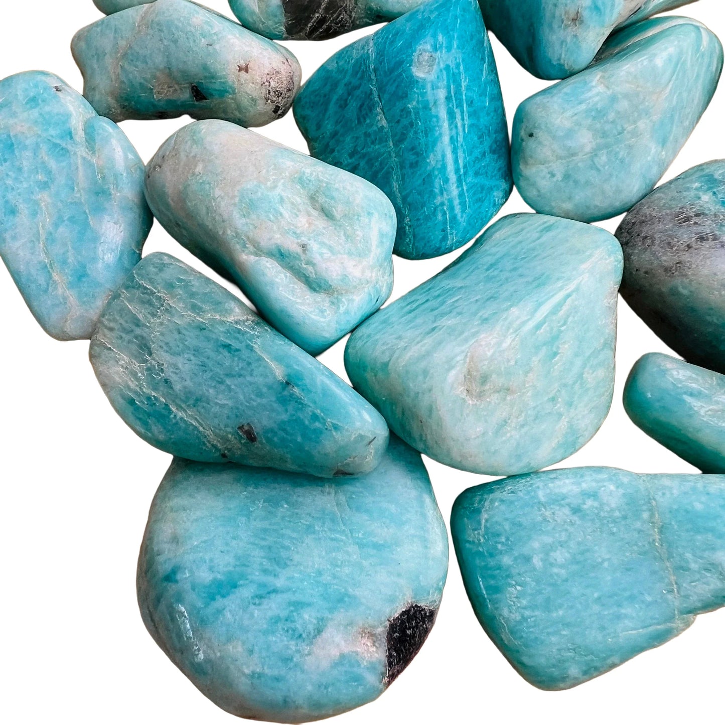 Macro view of Amazonite tumbled stone, sourced from Amboasitra, Madagascar, showing natural sheen.