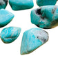 Natural light context of Amazonite tumbled stone, from Amboasitra, Madagascar, associated with Confidence, shown for shape and scale.