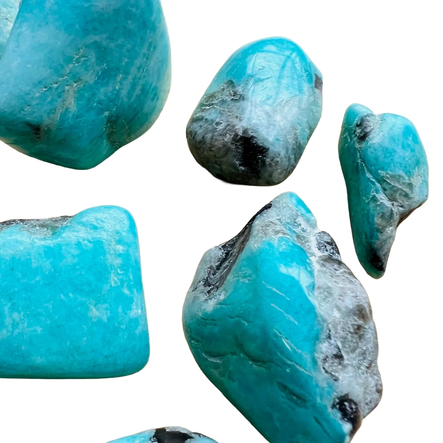 Detail shot of Grade AA Amazonite tumbled stone under natural light