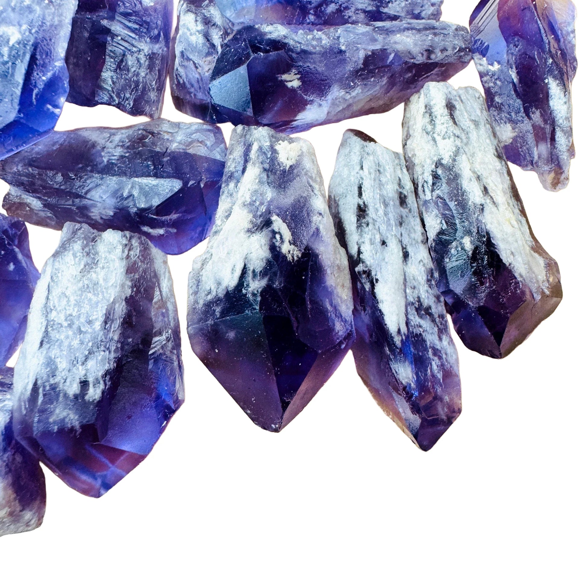 Side-on view of Grade AAA Amethyst raw point, from Brazil, showing tight grain.