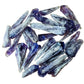 Surface detail of Amethyst raw point, showing natural color depth, turned to for Stress Relief and Sleep.