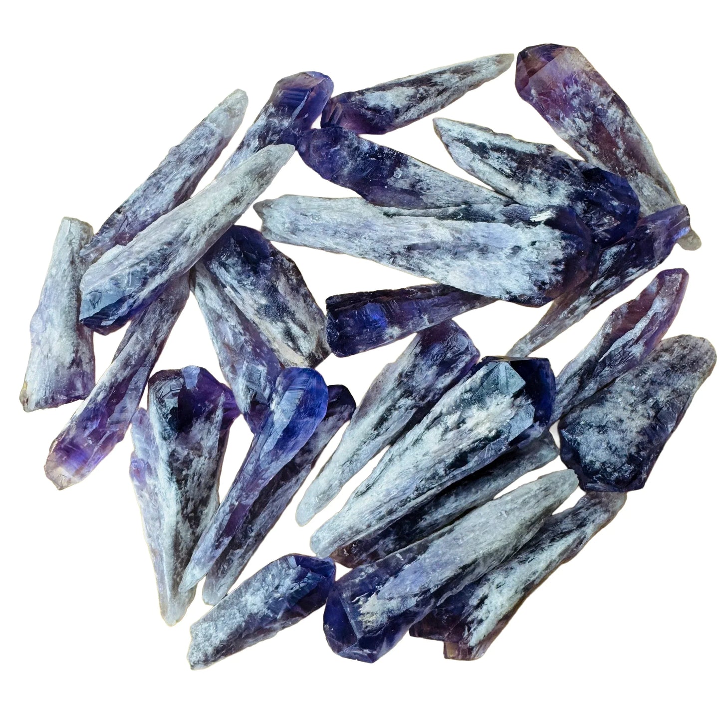 Surface detail of Amethyst raw point, showing natural color depth, turned to for Stress Relief and Sleep.