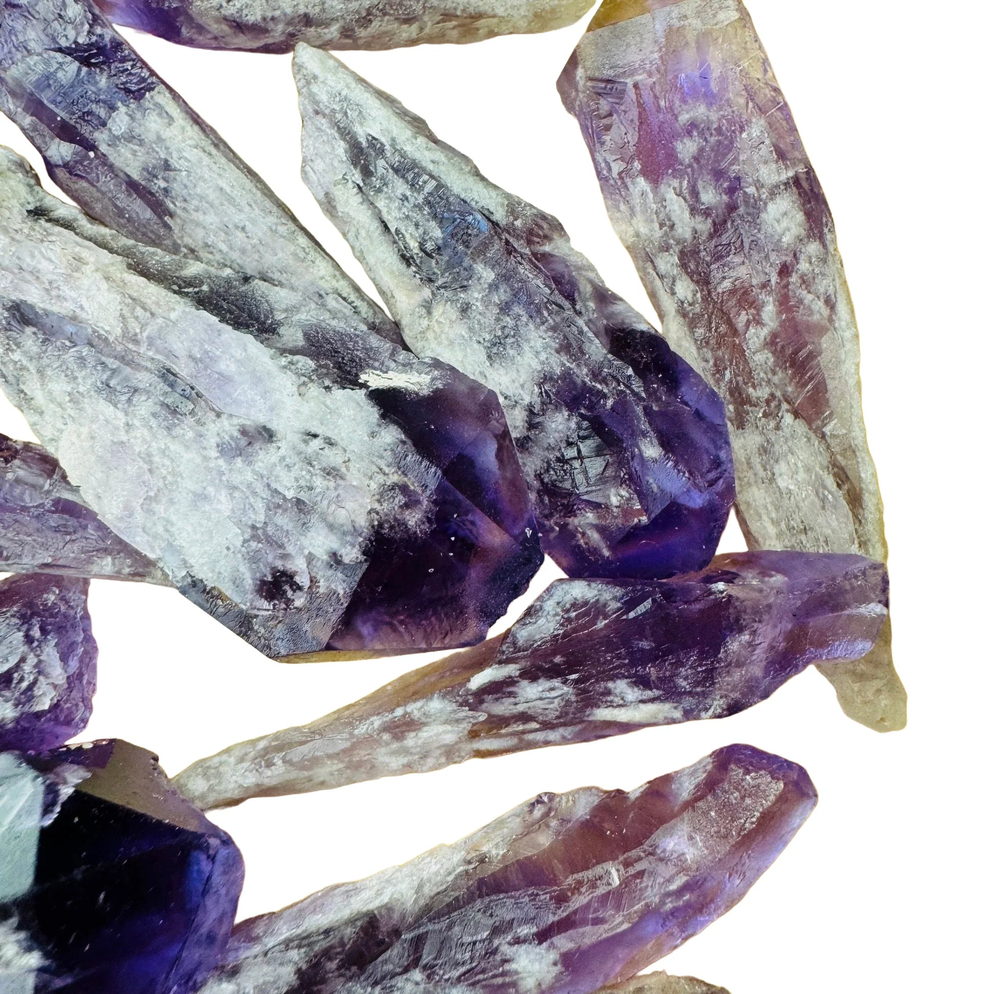 Side-on view of Amethyst raw point, sourced from Bahia, Brazil, traditionally used for Stress Relief and Sleep.