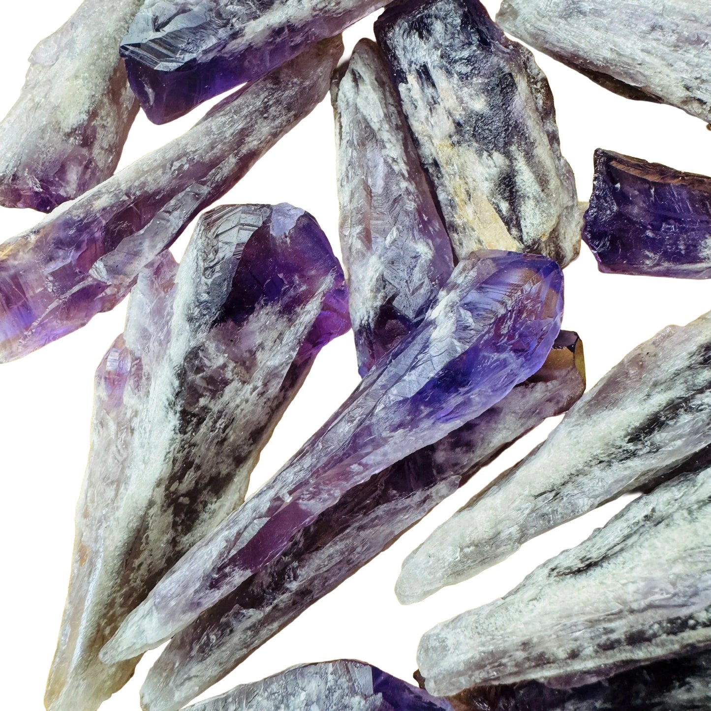 Grade a amethyst point held in hand for size reference