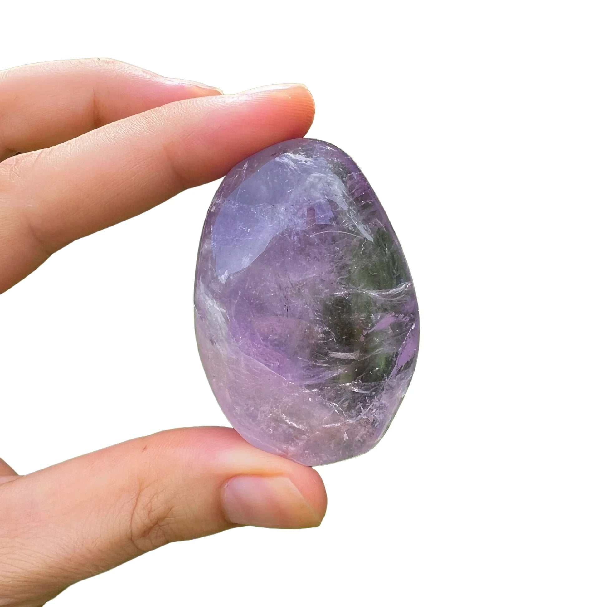 Macro view of Amethyst palm stone, showing matte finish, turned to for Stress Relief and Sleep.